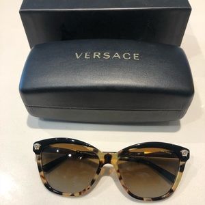 Versace sunglasses.